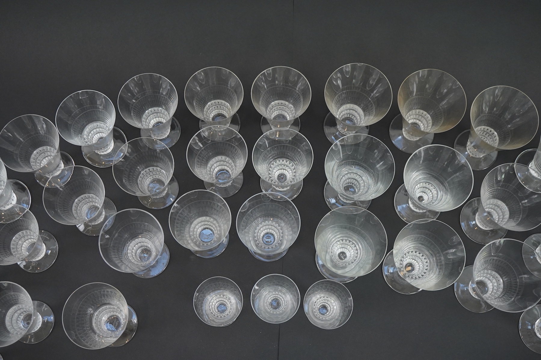 Lalique: A suite of 'Bourgueil' pattern drinking glasses